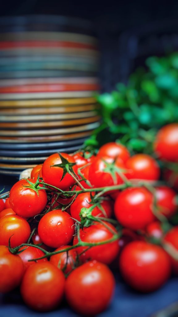 Close up shot of cherry tomatoes in a bunch