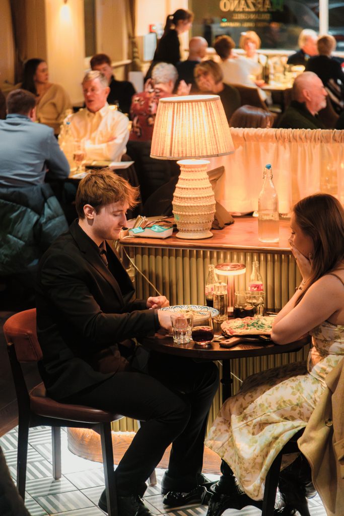 a couple dining at Marzano Italian York
