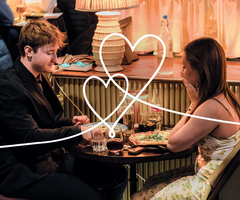 Couple enjoying a romantic Valentine’s Day dinner at Marzano Italian Grill in York, featuring candlelit tables, Italian food and an intimate dining atmosphere