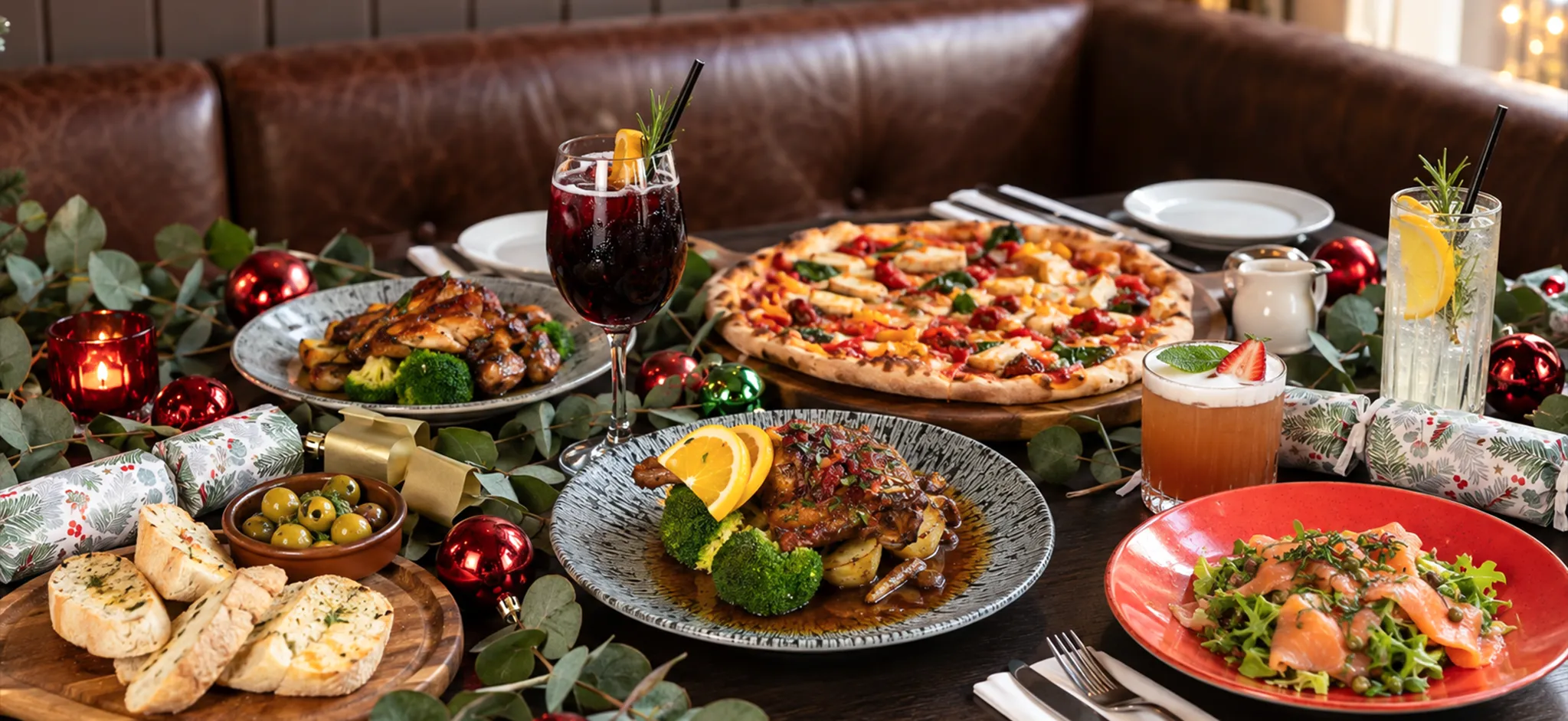 Festive Christmas dining table at Marzano Italian Grill in York with food, drinks and seasonal decorations.